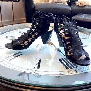 Vince Camuto black sandals.